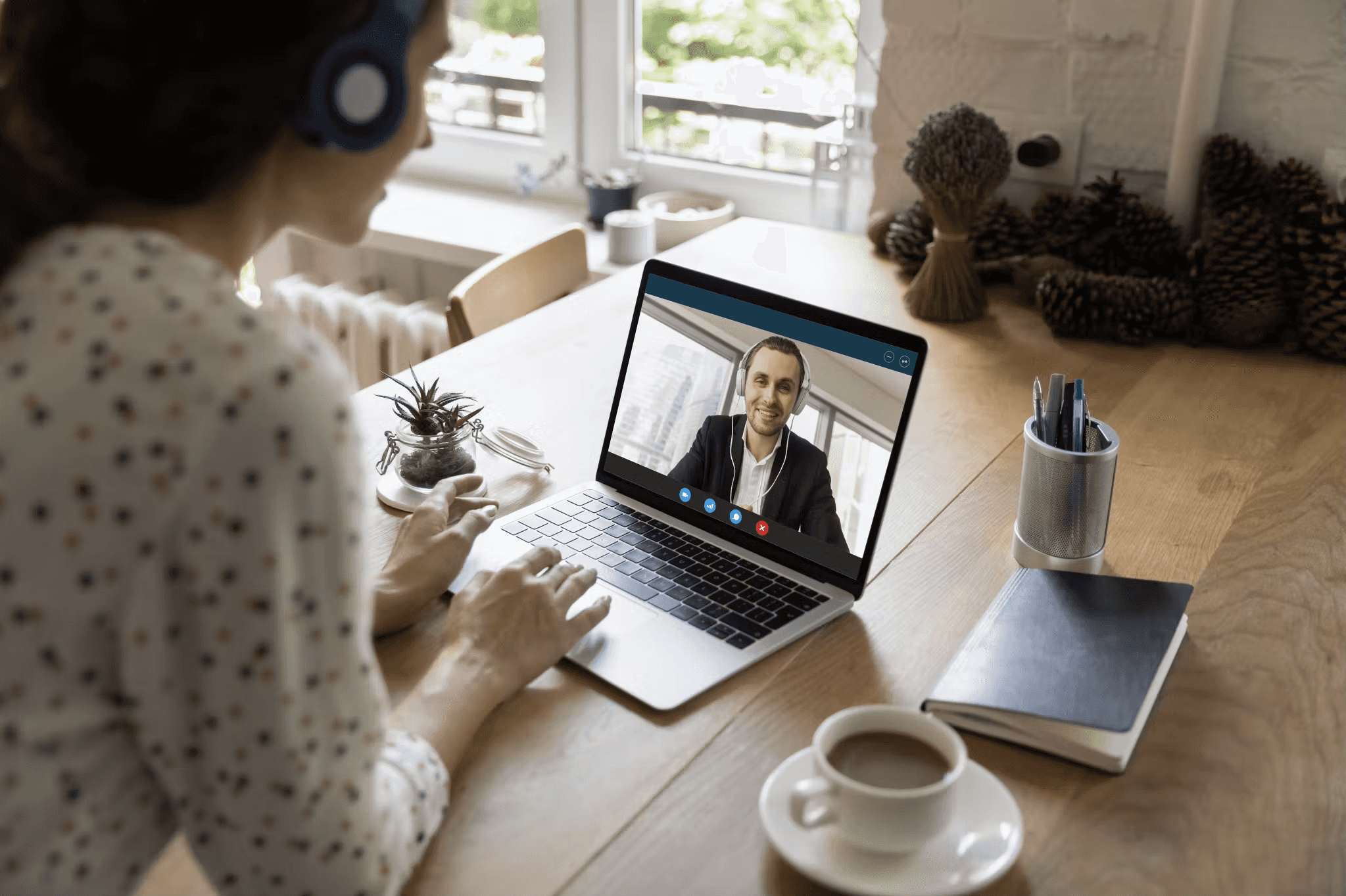 Female student having a virtual meeting with her Fashion Sustainability course mentor