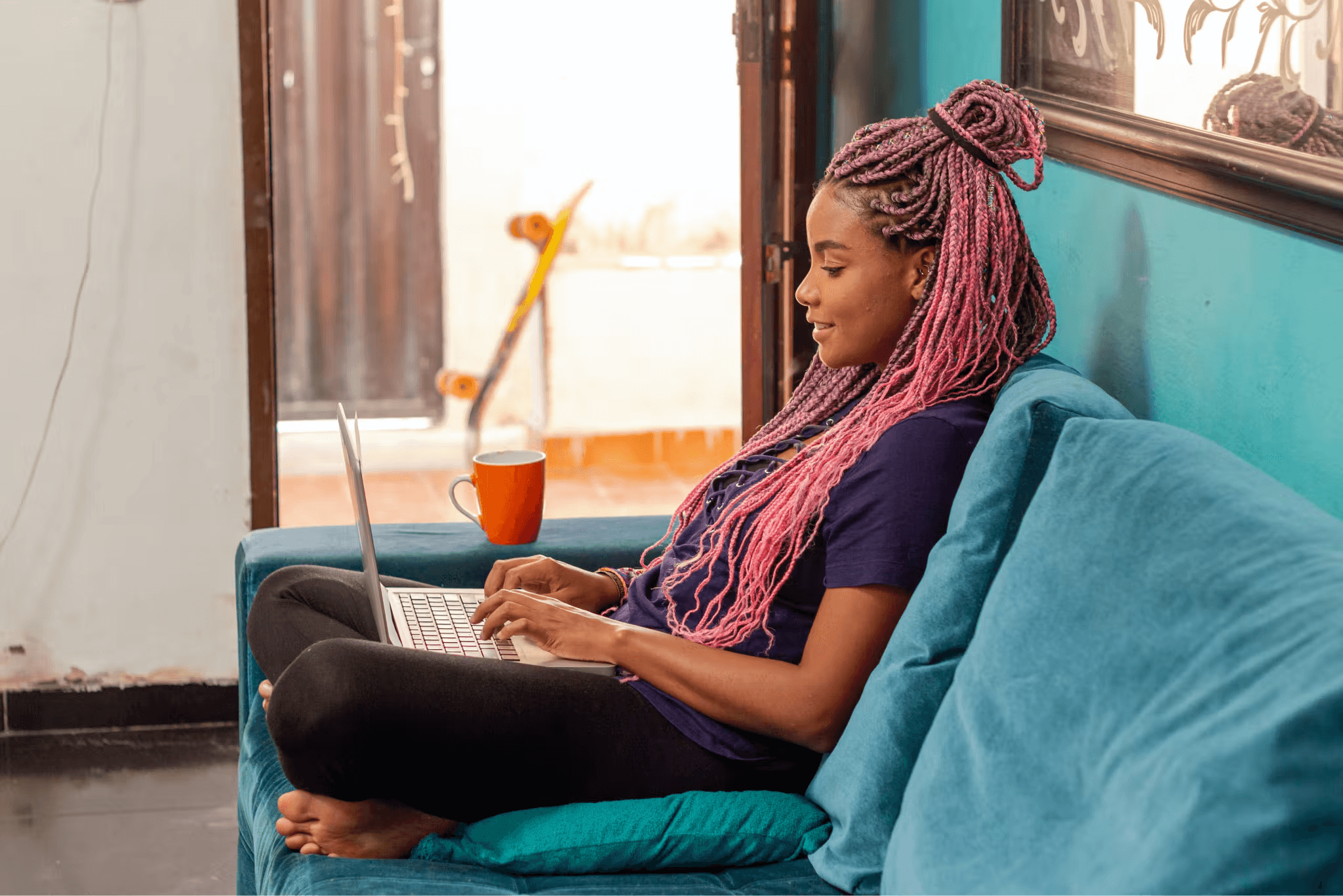 Student taking the Fashion Sustainability course at her own pace from her laptop